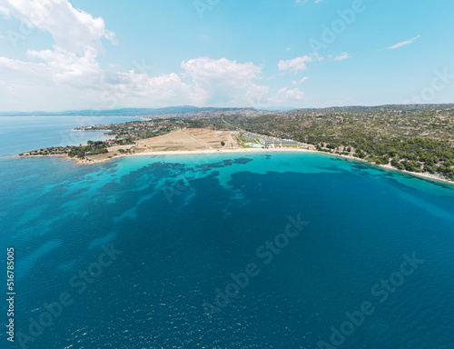 Aerial view of Agios Ioannis beach in Sithonia peninsula of Chalkidiki, Greece, Tropical turquoise water during summer holiday season