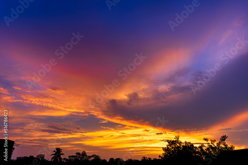 Dramatic colorful monsoon cloud formation in the sky during sunset