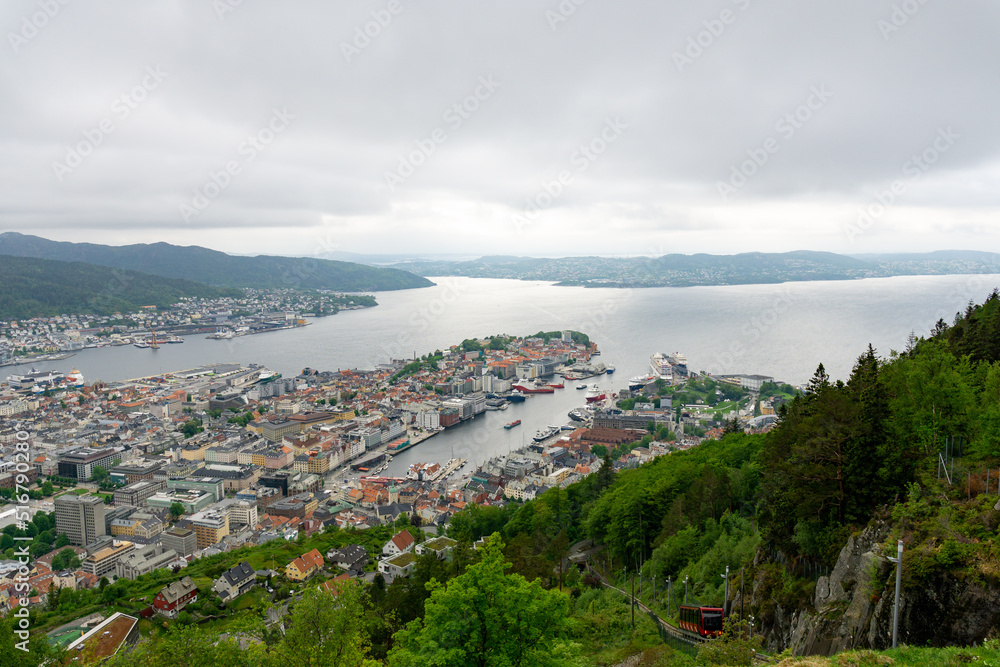 Views from the viewpoint to the city of Bergen where you can see the houses and the fjord.