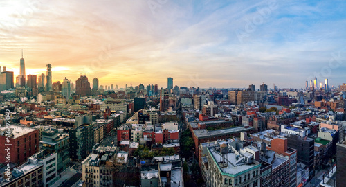 Panoramic New York City skyline view as dusk falls on the buildings of Manhattan