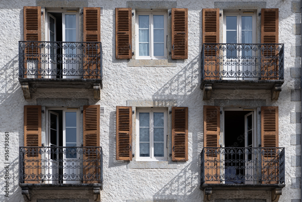 Classic facade with balconies and window shutters in Chamonix France