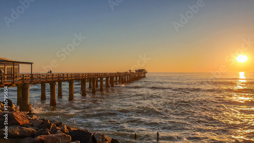 Fotografie sunset on the jetty of swakopmund Namibia