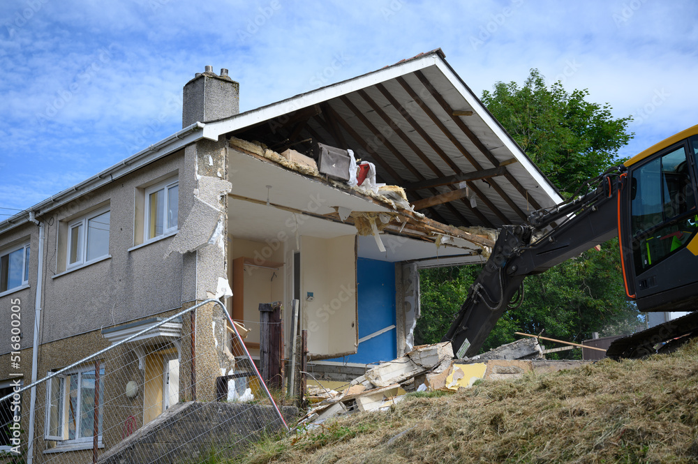 Property Demolition. A row of houses in united kingdom being demolished for land regeneration Property Demolition. A row of houses in united kingdom being demolished for land regeneration