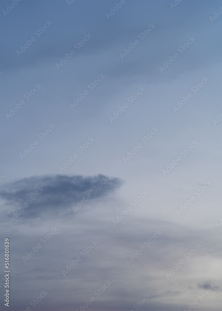Sunset sky vertical in evening with blue sunrise fluffy clouds Sunset sky vertical in evening with blue sunrise fluffy clouds