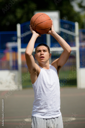 A Nineteen Year Old Teenage Boy Playing Basketball © Ben Gingell