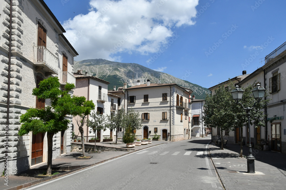 A street among the old stone houses of Campo di Giove, a medieval village in the Abruzzo region of Italy.