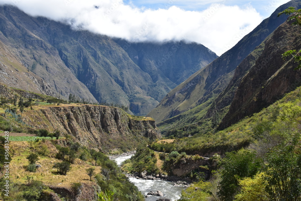 The dramatic landscapes of the Andes Mountains and cloud forests around the hiking path on the Inca Trail in Peru The dramatic landscapes of the Andes Mountains and cloud forests around the hiking path on the Inca Trail in Peru