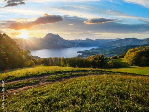 Peaceful autumn Alps mountain lake. Sunrise view to Traunsee lake, Gmundnerberg, Altmunster am Traunsee, Upper Austria.
