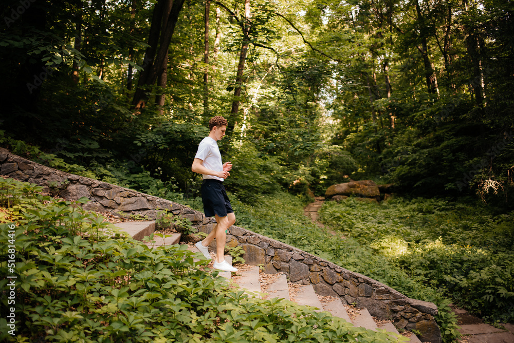 Man jogging in the park. Stair running