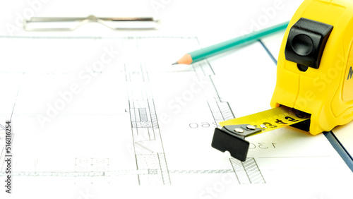 House keys and roulette on the drawings. the concept of construction and purchase of new housing