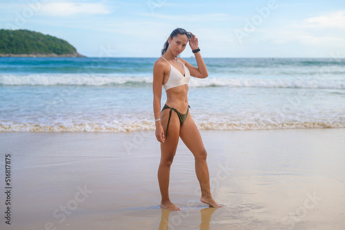 Young Beautiful woman in Bikini enjoying and relaxing on the beach, Summer, vacation, holidays, Lifestyles concept.