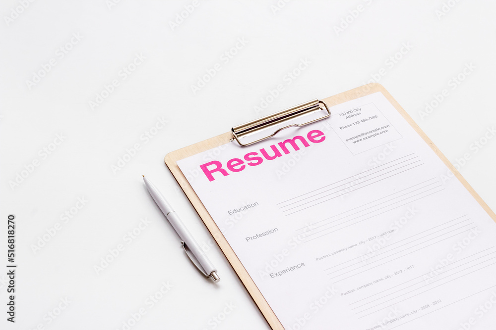 Searhing for a new job. Resume application form on office table Searhing for a new job. Resume application form on office table