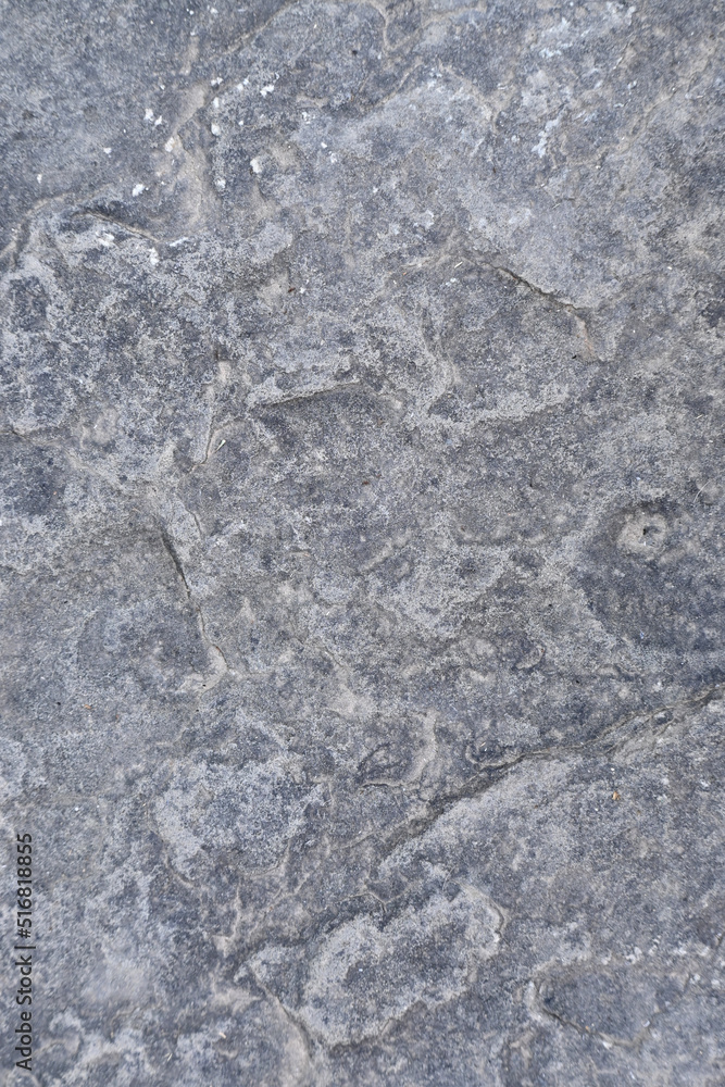 Naklejka premium closeup the old and big grey brown stone soft focus natural grey brown background.