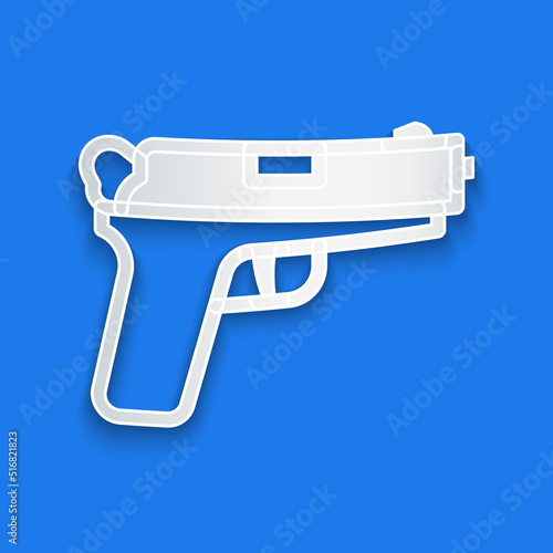 Paper cut Pistol or gun icon isolated on blue background. Police or military handgun. Small firearm. Paper art style. Vector