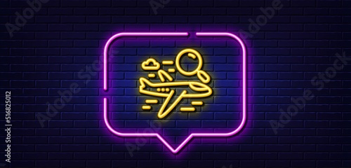 Fototapeta Naklejka Na Ścianę i Meble -  Neon light speech bubble. Search flight line icon. Airplane with magnifying glass sign. Find airport flights symbol. Neon light background. Search flight glow line. Brick wall banner. Vector