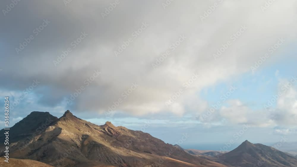 Clouds timelapse of over desert landscape, Fuerteventura island Clouds timelapse of over desert landscape, Fuerteventura island