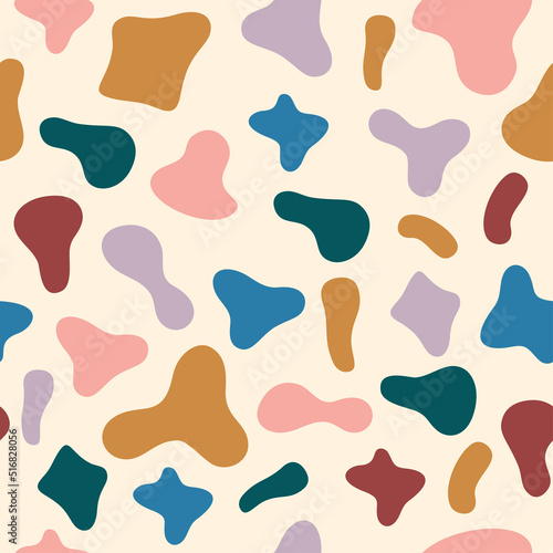Vector hand drawn seamless pattern with colorful spots or shapes. Modern design. Wallpaper, textiles.