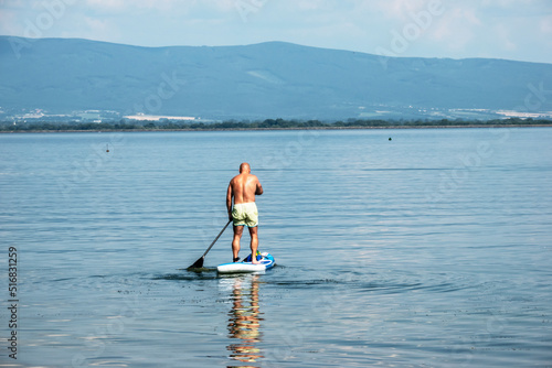 Summer sports activity on a paddleboard