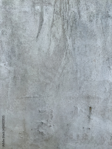 Concrete grey raw wall texture with natural surface grunge patterns