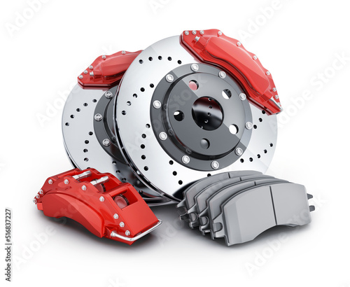 Car brake disc and pads on white background photo