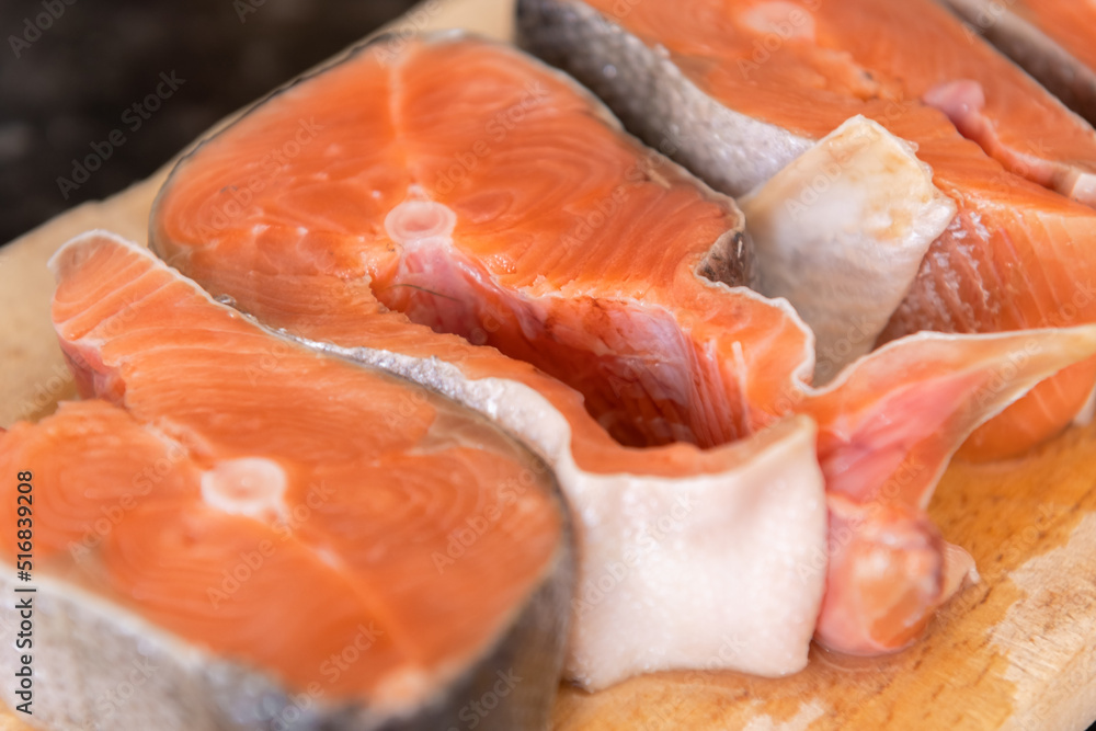 Red salmon fish. Salmon steaks. Healthy eating red salmon fish. Photo on fish production. Red salmon fish. Salmon steaks. Healthy eating red salmon fish. Photo on fish production.