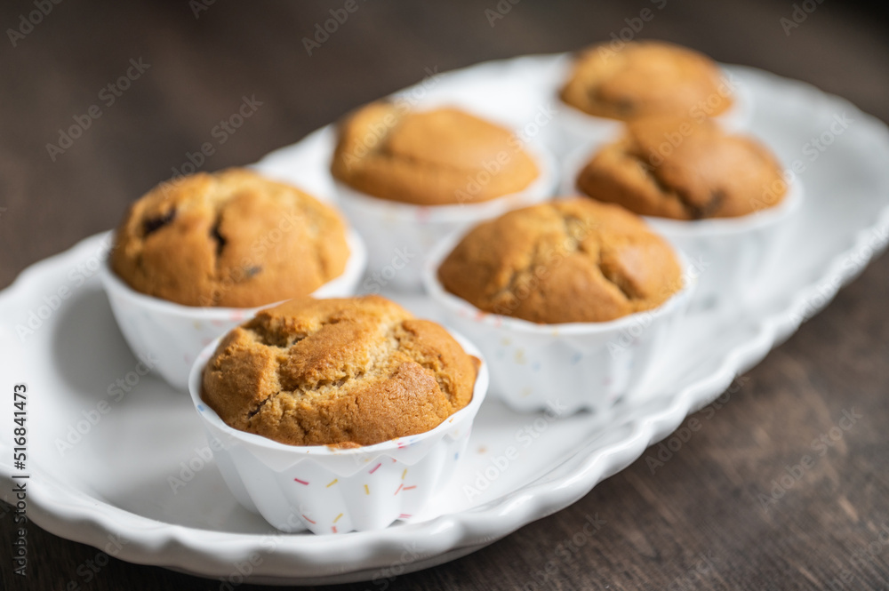 Appetizing muffins on beautiful plate Appetizing muffins on beautiful plate