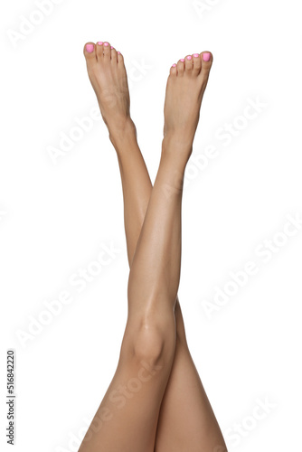 Woman with beautiful long legs on white background  closeup