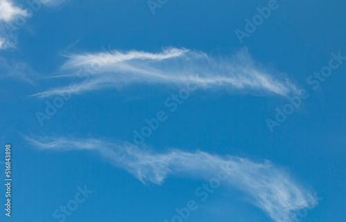 Summer blue sky  cirrus clouds light white background. beautiful summer blue background