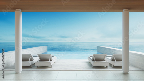 Luxury lounge chair on the beach sea - 3D rendering