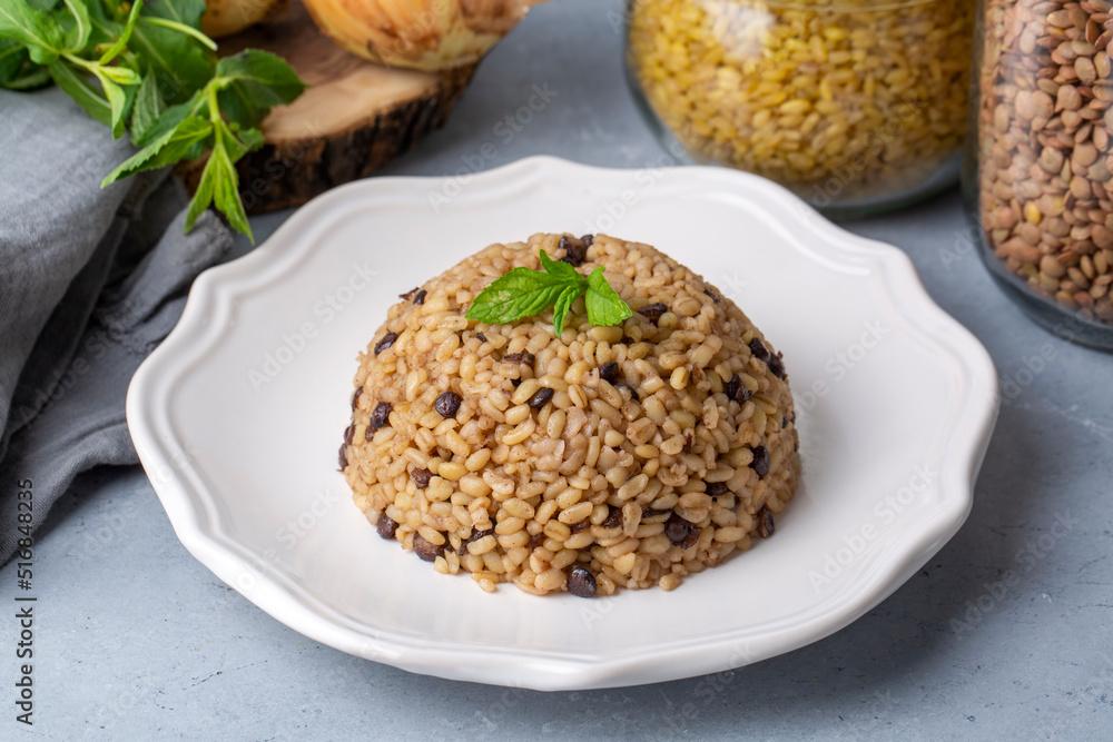 Traditional delicious Turkish foods; bulgur pilaf with green lentils (Turkish name; yesil mercimekli bulgur pilavi) Traditional delicious Turkish foods; bulgur pilaf with green lentils (Turkish name; yesil mercimekli bulgur pilavi)