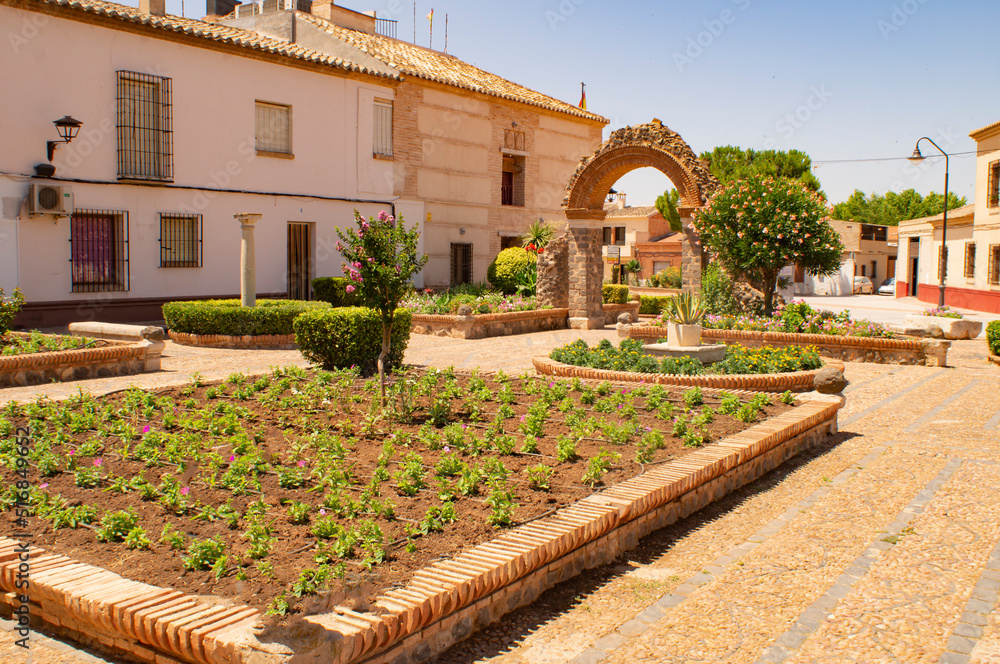 Gardens next to the historical monument of Castillo de San Fernando or Doña Berenguela, in an Arab fortress built between the 10th and 11th centuries in the municipality of Bolaños de Calatrava in the