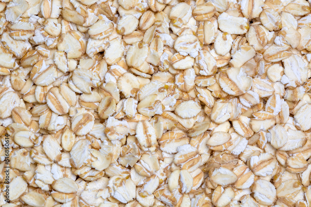 Heap of dry rolled oats isolated Heap of dry rolled oats isolated