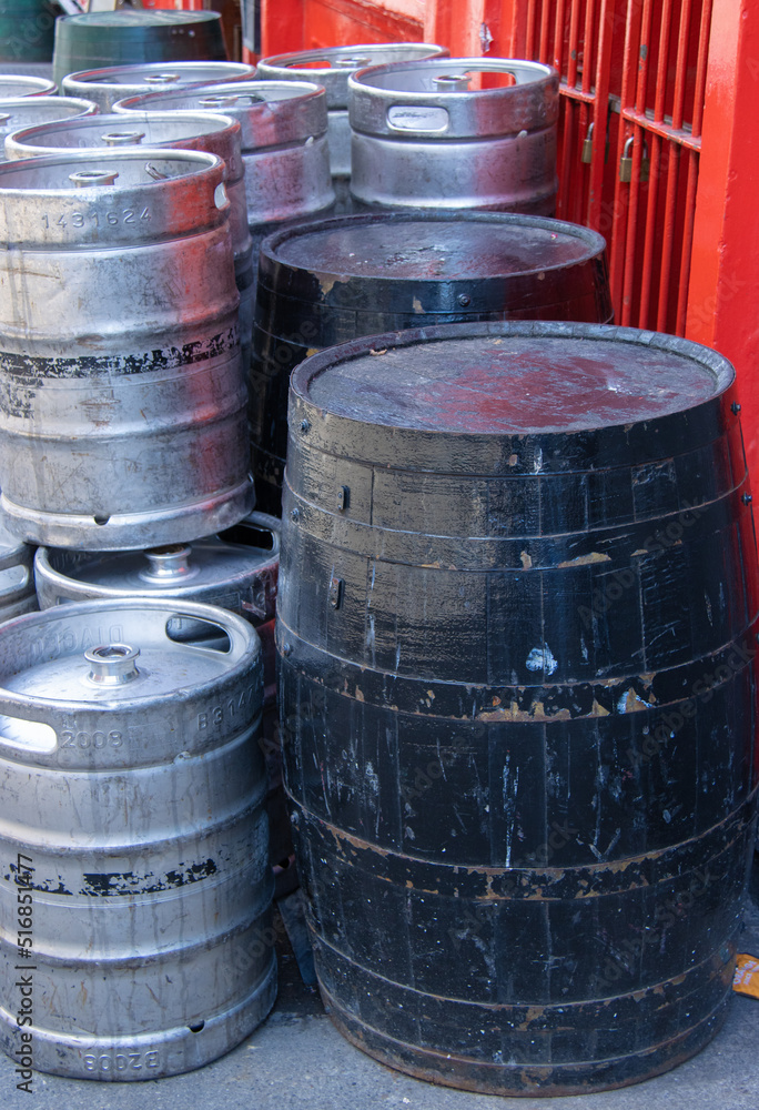 old wooden and new metal beer barrels old wooden and new metal beer barrels