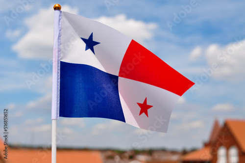 national flag of Panama consists of red and blue quaters and two stars photo