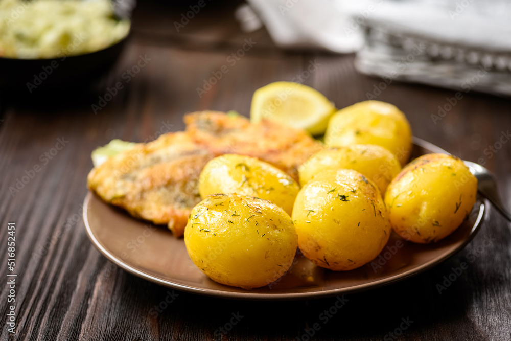fried fish with new potatoes