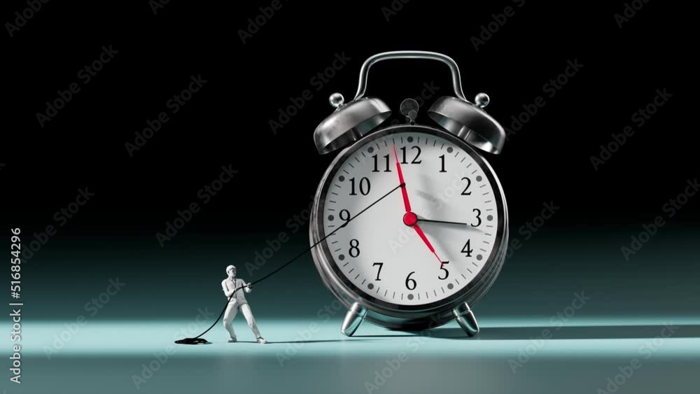 A businessman tries to stop time on an alarm clock. A man pushes back hour arrow