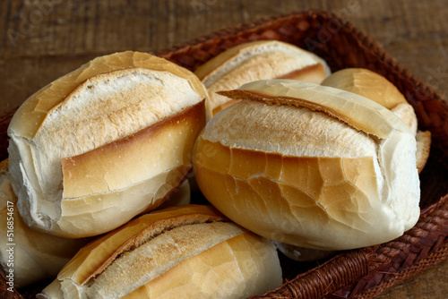 French bread basket over brown natural fiber photo