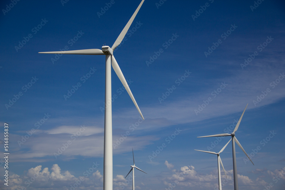 wind turbines on a cloud streaked sky wind turbines on a cloud streaked sky