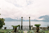 Garden of an ancient villa with columns in the town of Varenna on the shores of Lake Como