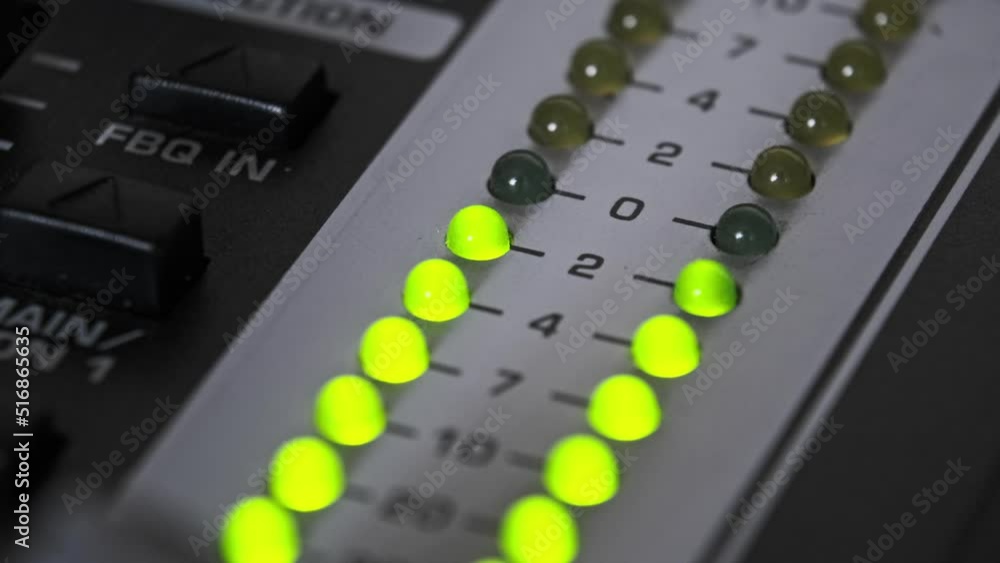 LED indicator of sound level signal on the mixing console. Closeup