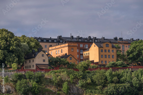Photography Old 1800s houses at board walk at the street Monteliusvägen at the blocks at the