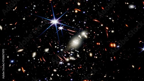 Wide-field view of the early universe. Zooming into the deep field of Galaxy Clusters. Fly towards distant galaxies. photo