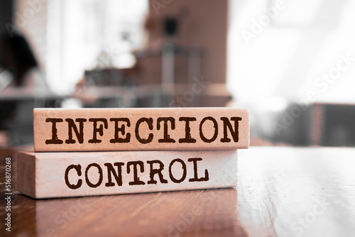 Photography Wooden blocks with words 'Infection Control'.