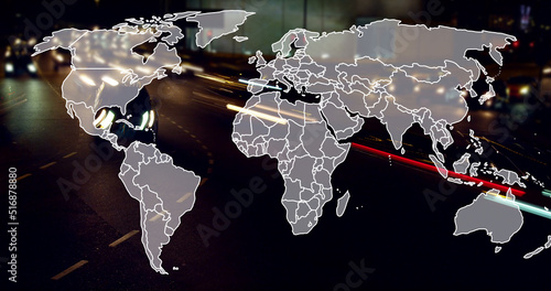 Image of world map over fast speed traffic on city road at night