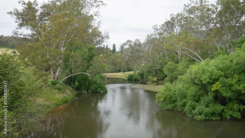 Upstream view of the Mitta Mitta River at the township of Mitta Mitta, north-east Victoria, Australia. November 2021. Upstream view of the Mitta Mitta River at the township of Mitta Mitta, north-east Victoria, Australia. November 2021.