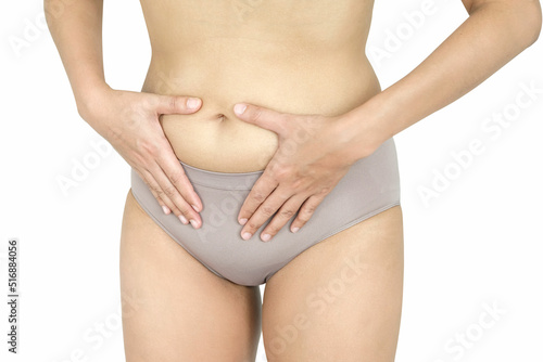 woman holding her stomach with her hand She has a stomachache. and Period Pain