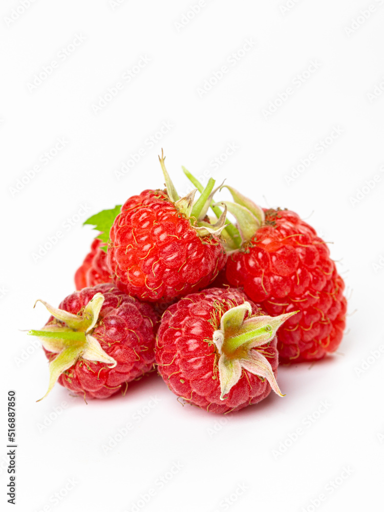 set of beautiful and ripe raspberries isolated on white background set of beautiful and ripe raspberries isolated on white background