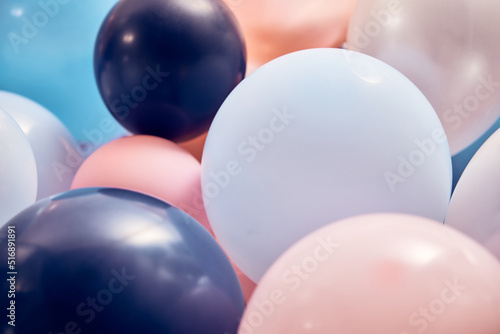 Bright balloons in decorated room