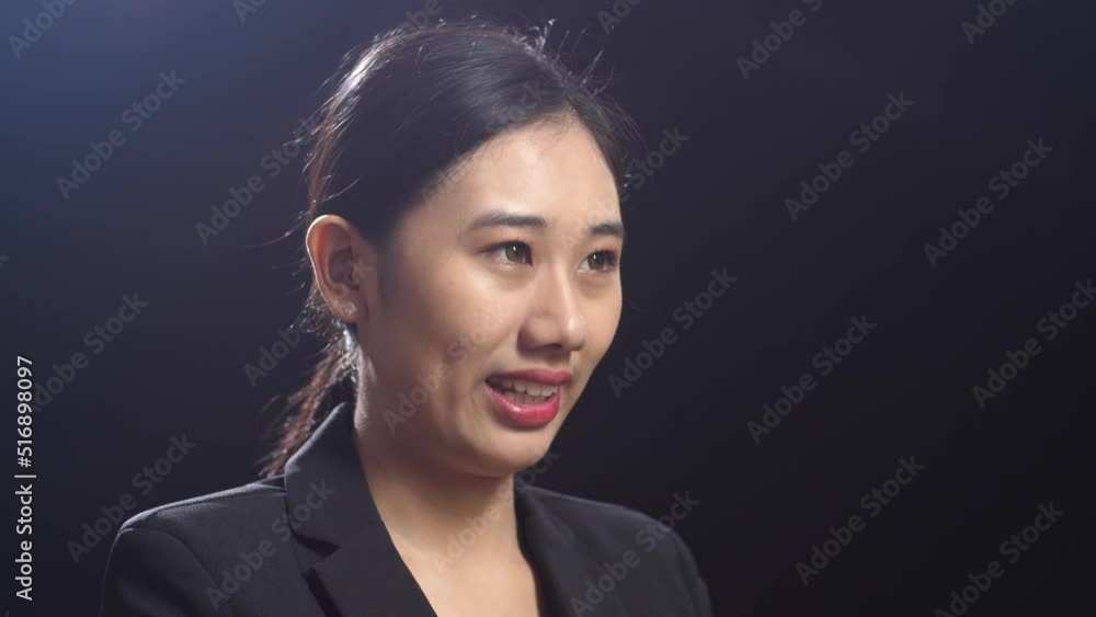 Side View Of Smiling Asian Speaker Woman In Business Suit Clapping Her Hands And Looking Around While Standing In The Black Screen Studio
Side View Of Smiling Asian Speaker Woman In Business Suit Clapping Her Hands And Looking Around While Standing In The Black Screen Studio
