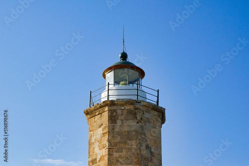 beautiful traditional Lighthouse, made of stone, French architecture